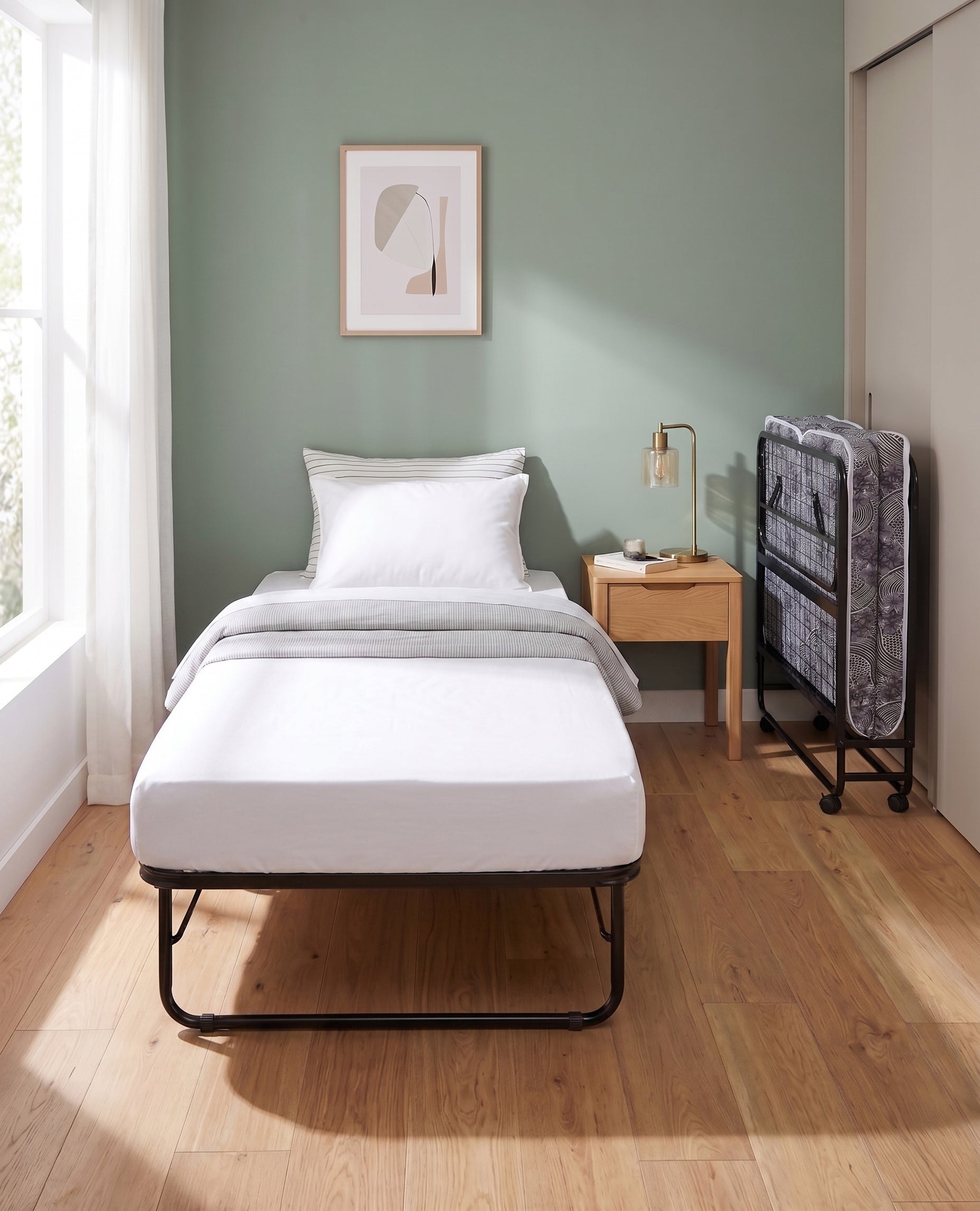 Durable powder-coated steel frame construction Folding Bed – IF-385/386